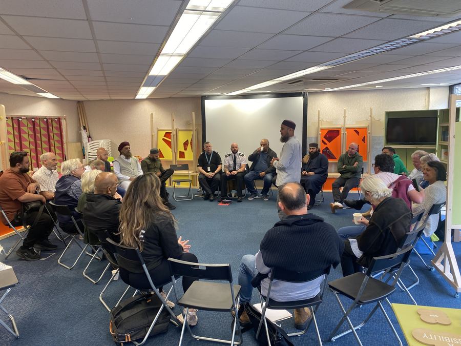 Community circle discussion with police officers