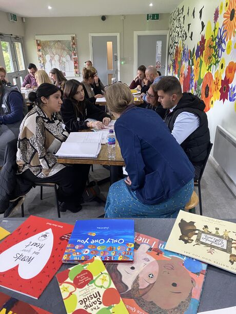 Reviewing storybooks at a community workshop